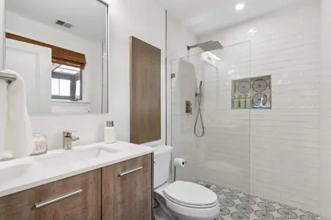 Full bathroom with walk-in shower