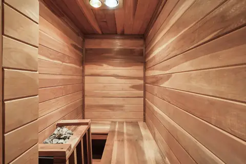 The cedar sauna with wooden benches